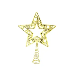 Detailed view of a gold filigree Christmas star tree topper with a spiral base.