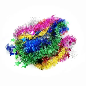 Detailed view of vibrant multi-colored Christmas tinsel garlands with metallic star accents