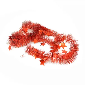 Close-up of a 2-meter long red Christmas tinsel garland with shiny star details.