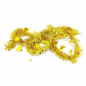 Close-up detail of 2m gold Christmas tinsel garland featuring shiny five-pointed star accents