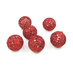 Detailed view of red hollow glitter Christmas ball ornaments for tree decoration