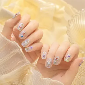 Detail view of luxury jelly nail stickers with colorful gemstones and teardrop art