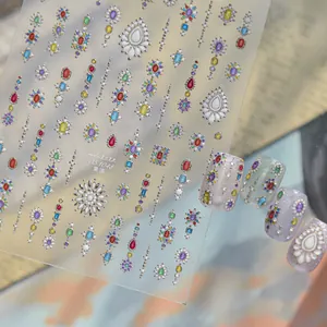 Detail view of luxury jelly nail stickers with colorful 3D gem and bead patterns