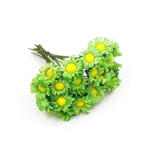 Detailed macro view showing a bundle of mini artificial green daisies with yellow centers