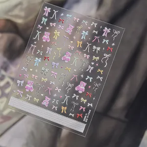 3D embossed nail art sticker sheet featuring sweet pastel bows and colorful teddy bears