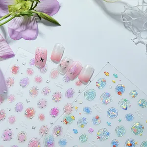 Close-up of jelly shell-light nail stickers with floral and ocean motifs and iridescent shine.