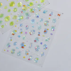 Close-up of 3D ocean-themed jelly shell nail stickers with holographic fish designs