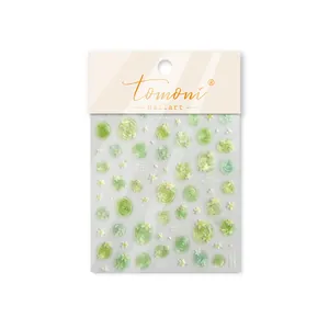 Detail view of tomoni jelly shell luster nail art stickers with green floral design