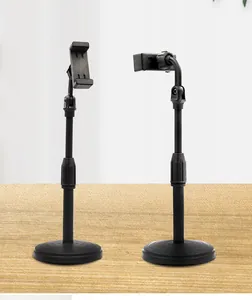 Adjustable phone stand for live streaming, desktop round base mount with 360 rotation.