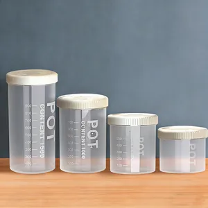 Clear plastic storage jars set with lids and capacity scales for kitchen food and snacks detail.