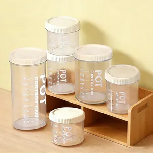 Plastic airtight storage jars set with scale marks for kitchen food nuts and snacks.