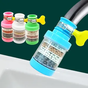 Kitchen faucet filter detail, splash-proof nozzle with multi-layer filtration stones and clamp.