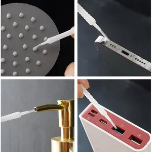 Mini cleaning brush for shower heads, phone ports, and small gap crevices in household use.