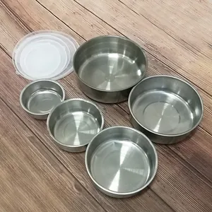 Stainless steel round food storage bowl set with lids, detail view showing nested sizes.
