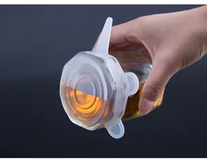 Silicone stretch lid detail showing airtight seal and leak-proof performance on glass jar.
