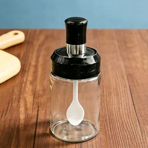 Barattolo per spezie in vetro con coperchio a cucchiaio integrato, contenitore trasparente.