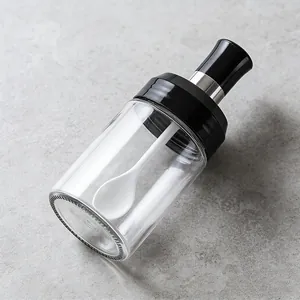 Barattolo per condimenti in vetro trasparente con coperchio a cucchiaio integrato, cucina.
