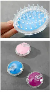 Silicone scalp massage brush detail view, transparent shell and soft bristles for hair wash.