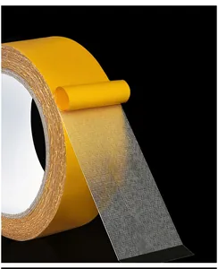 Clear detail shot of strong mesh double sided tape showing transparent adhesive layer texture.