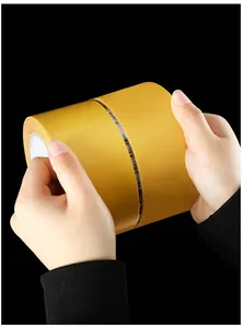 Close-up view of strong double-sided mesh tape roll, showing high viscosity and cloth backing.