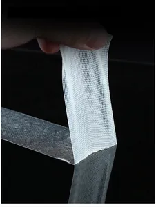 Grid double sided tape detail shot showing high viscosity mesh cloth adhesive tape.