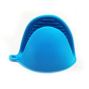 Blue silicone pinch mitt detail, heat resistant kitchen pot holder with anti slip grip design.