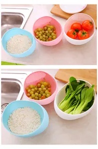 Plastic kitchen draining bowl, multi-functional rice washing basket for fruits and vegetables.