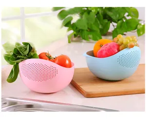 Plastic kitchen drain basket for washing rice, vegetables, and fruits with fine drainage holes.