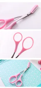 Eyebrow trimming scissors with comb detail, pink plastic handle, precise makeup tool.