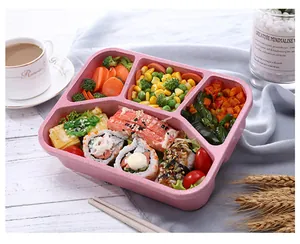 Pink 4-compartment wheat straw lunch box with food, portable bento container for daily office use.
