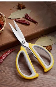 Edelstahl Küchenschere Detailansicht mit scharfen Klingen und ergonomischem gelb-grauem Griff.
