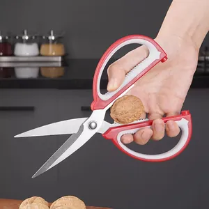 Ciseaux de cuisine multifonctionnels en acier inoxydable avec poignées rouges et blanches.