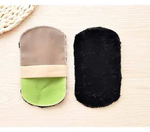 Portable faux wool shoeshine glove detail showing dual-sided design and hand strap convenience.