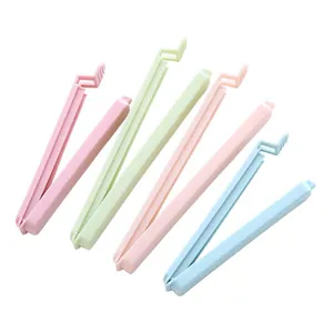 5-pack plastic food sealing clips for fresh snacks and bags. Durable kitchen storage tools.