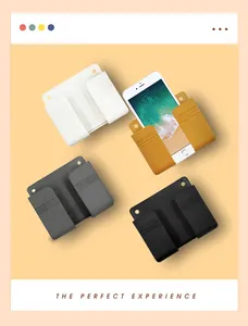 Wall-mounted phone holder remote control storage box bedside charging bracket multi-color.
