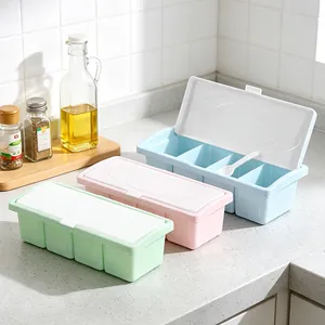 4-grid plastic kitchen seasoning box with spoon, multi-color condiment storage container.