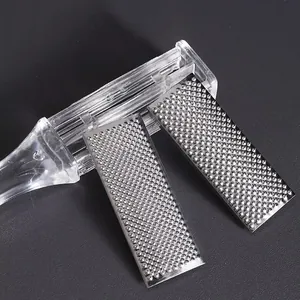 Double-sided foot file rasp for removing dead skin and calluses with clear handle.