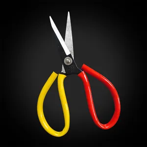 Professional tailoring scissors with metal blades and dual color red yellow handles for home use.