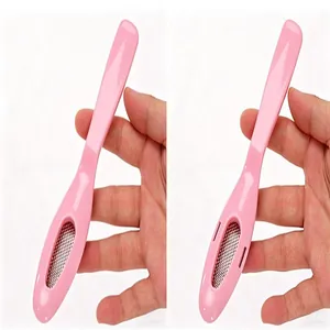 Pink foot file callus remover tool for dead skin removal, detail shot showing handheld design.