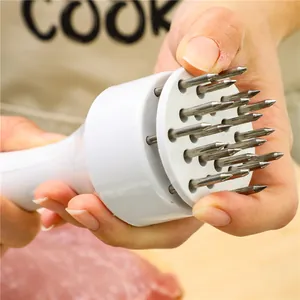 Batticarne in acciaio inossidabile con aghi affilati per bistecche tenere e cucina.