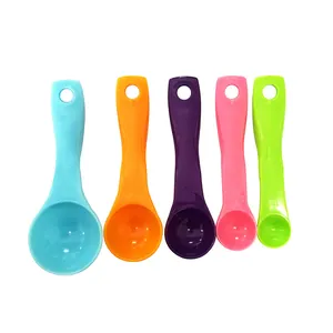 Colorful plastic measuring spoons set of 5 pieces for kitchen baking and cooking use.