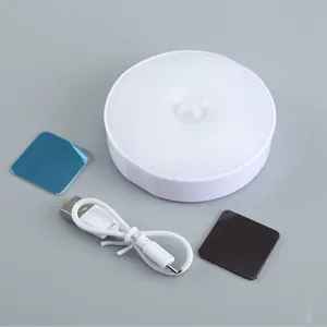 Portable round LED motion sensor night light, USB rechargeable magnetic wardrobe lamp.