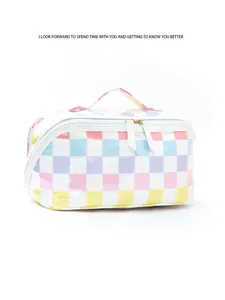 Pastel checkered cosmetic bag with top handle and double zipper for daily makeup storage.