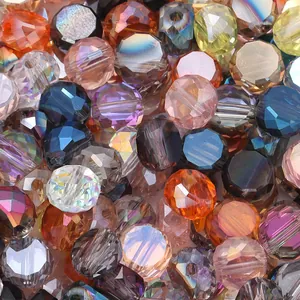 Closeup of multi-colored faceted crystal glass flat octagonal spacer beads for DIY jewelry.