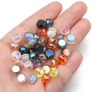 Closeup of multi-color faceted flat octagonal crystal glass spacer beads for jewelry DIY.