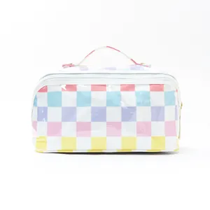 Colorful checkerboard cosmetic bag with top handle, large capacity travel makeup pouch.