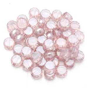 Light pink faceted crystal glass beads, flat round spacer beads for DIY jewelry making detail view.