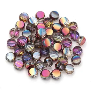 Close-up view of faceted crystal glass beads showing iridescent multi-color sparkle and fine cuts.