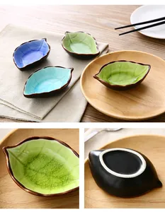 Gedetailleerd weergave van blad-vormige keramische sausbak met glazuur, ideaal voor keuken.