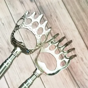 Stainless steel telescopic back scratcher with cute bear claw design for daily relaxing use.